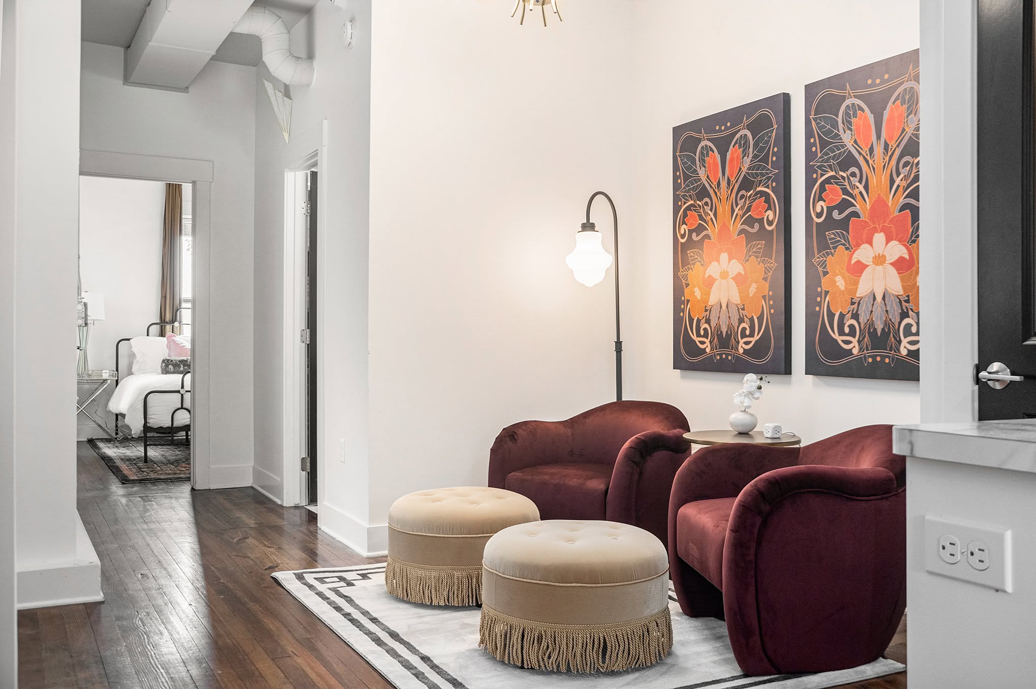 a clean living room with two cushions